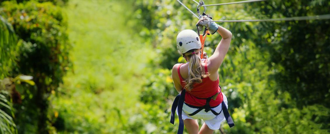 Woman ziplinning in Costa Rica