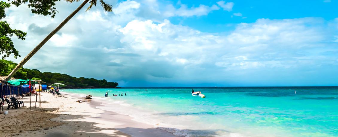 Cruise through the crystal-clear waters of Baru Island