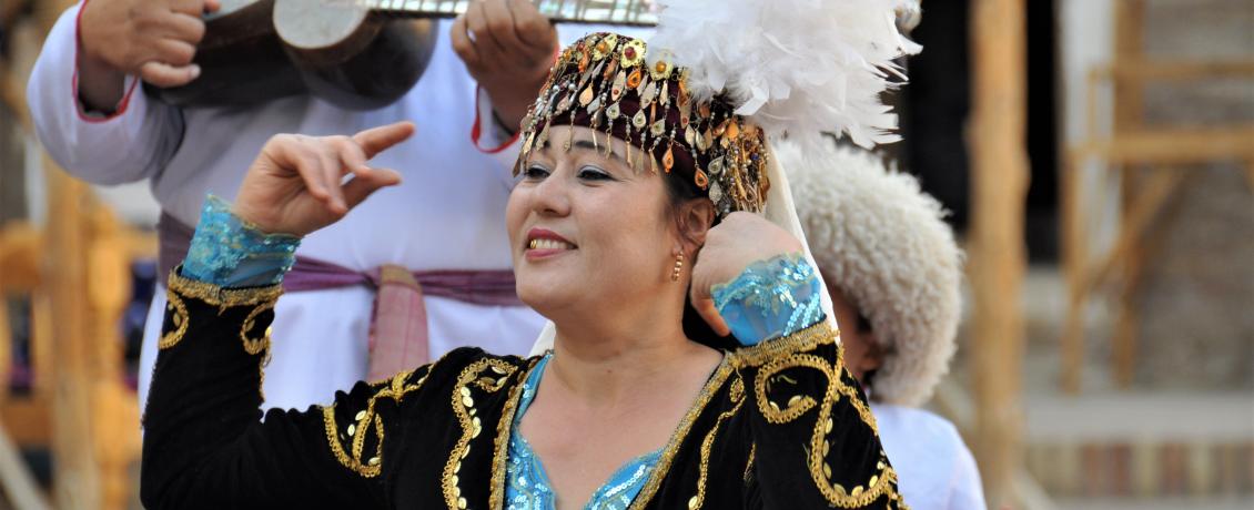 Uzbek folk artist in traditional attire. Credit Joelle Moreau.