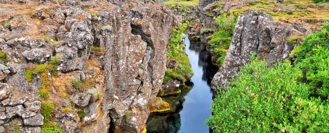 Aerial views of Thingvellir National Park in Iceland, highlighting a rift valley created by two diverging tectonic plates.