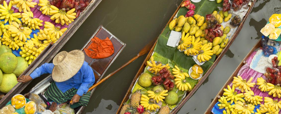 Aerial view of boats filled with fruits
