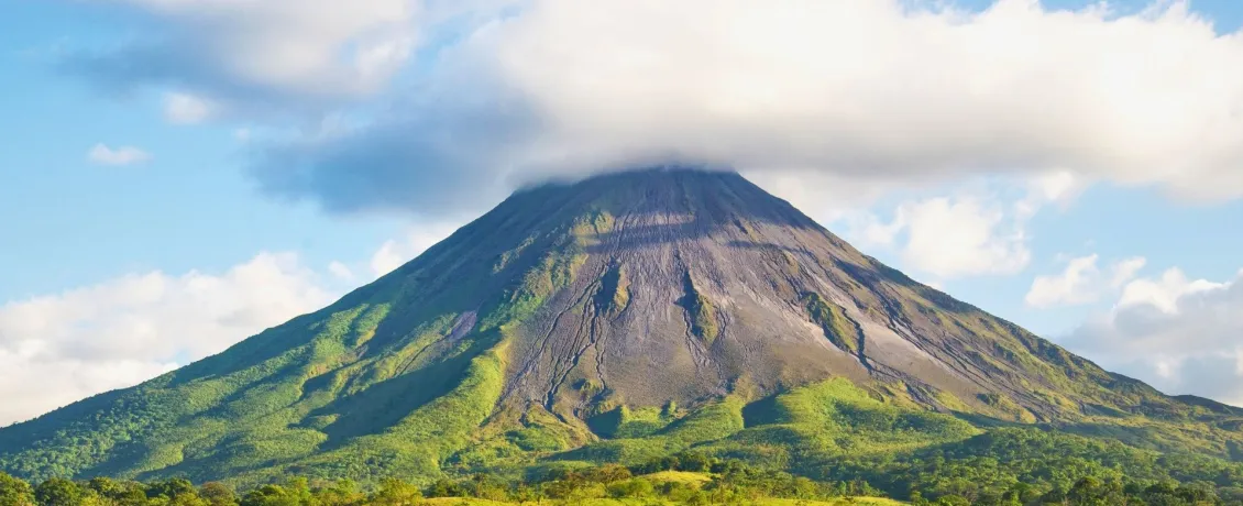Arenal Volcano rising above the rainforest canopy