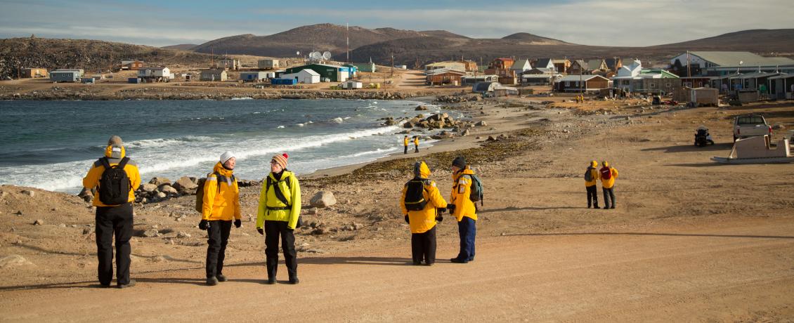 Passengers exploring the shores of Baffin Island