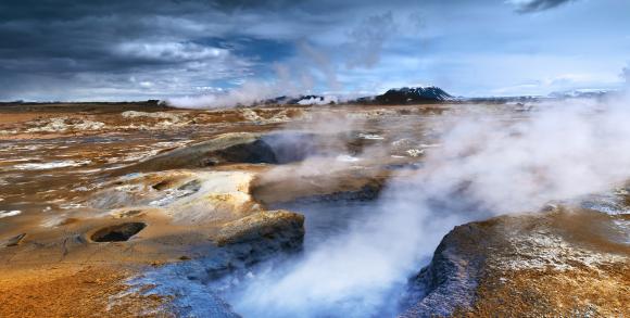 Shot of boiling mudpots and steaming fumaroles at Hverir, a highly active geothermal area in Northern Iceland.